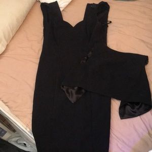 A black mid length dress with cover
